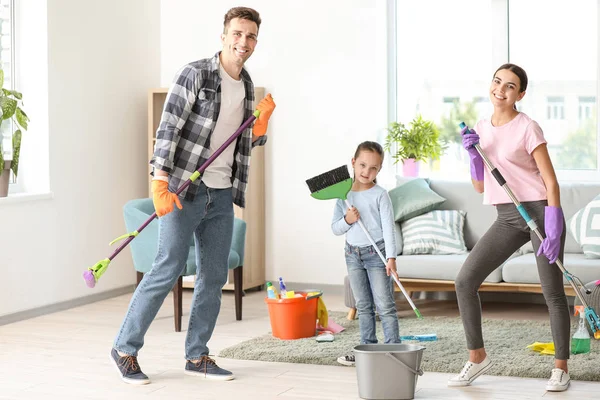 depositphotos_309282930-stock-photo-happy-family-cleaning-flat-together